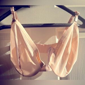 Transparent bra also has an extender so can also fit 34